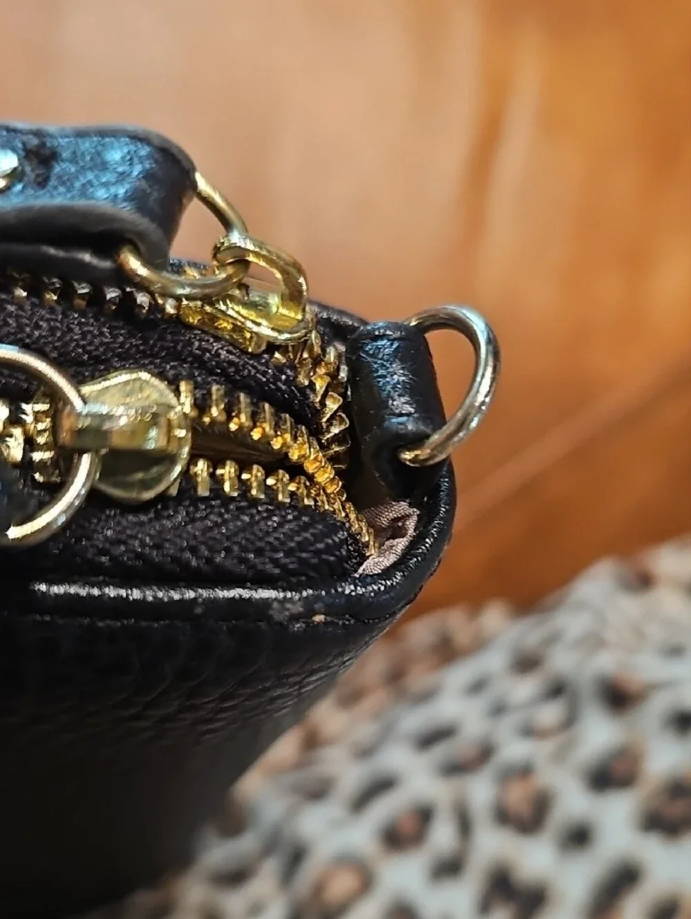 Anne Klein Black Pebbled Zip-Around Wallet with Gold Emblem